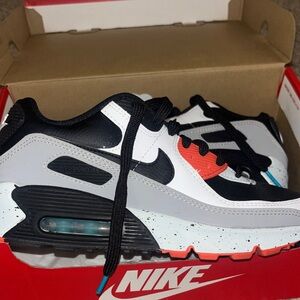 Nike Air Max 90 Black, White, and Orange Sneakers